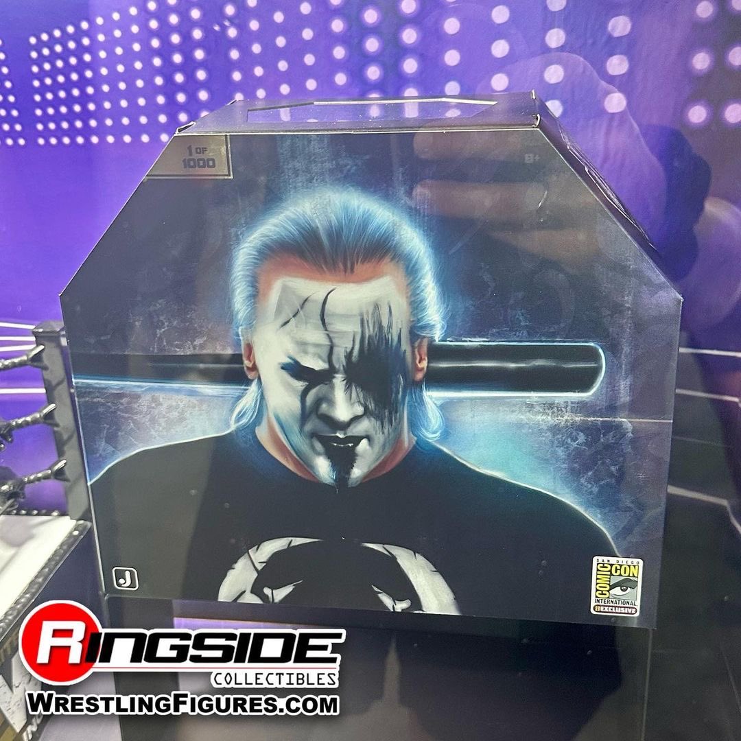 IMAGE DISTRIBUTED FOR JAZWARES, LLC. - Wrestling Icon Sting and Danhausen  check out their action figures at the Jazwares San Diego Comic-Con booth on  Saturday, July 22, 2023 in San Diego, Calif. (
